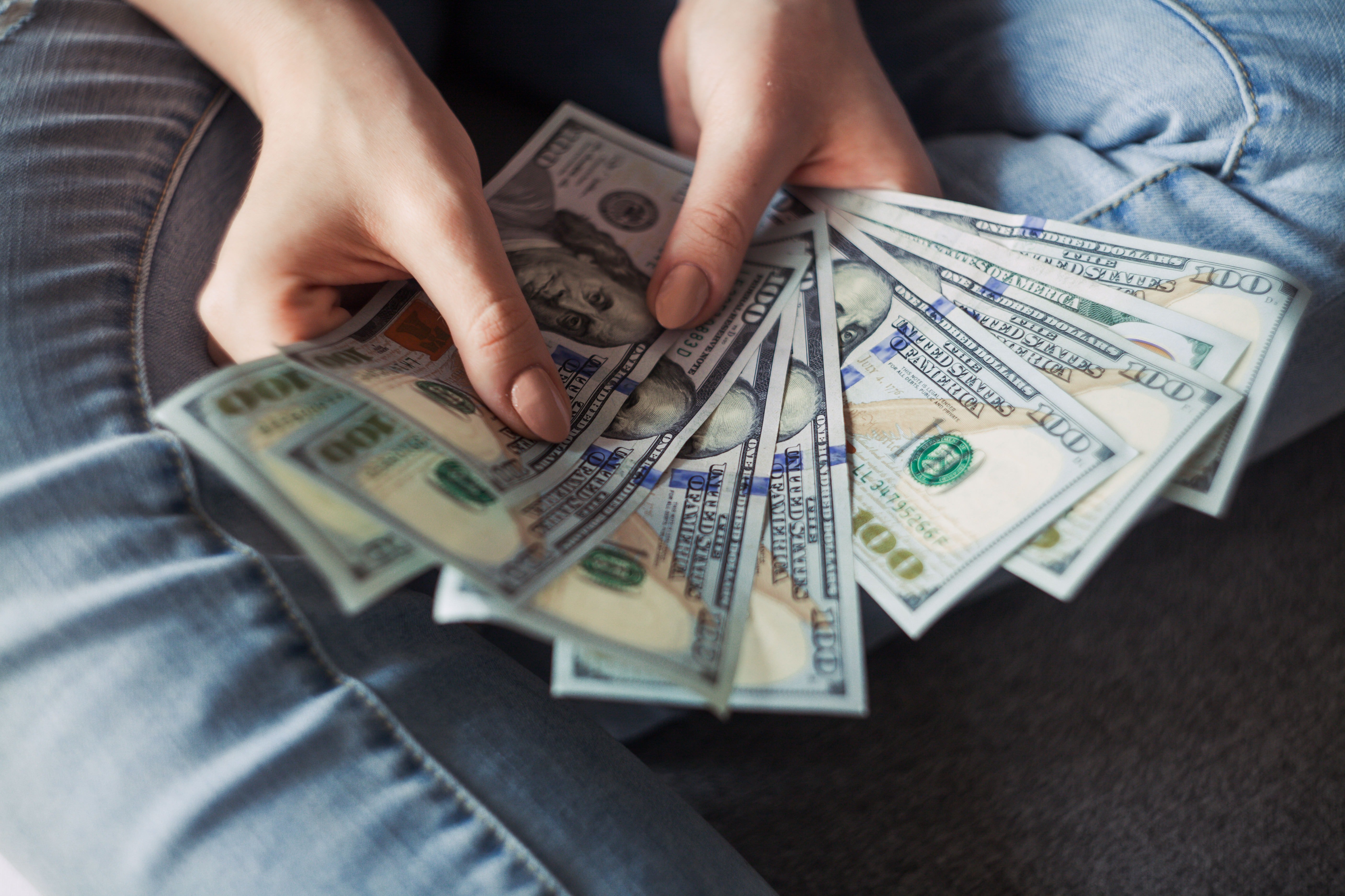 Close-up of woman holding money