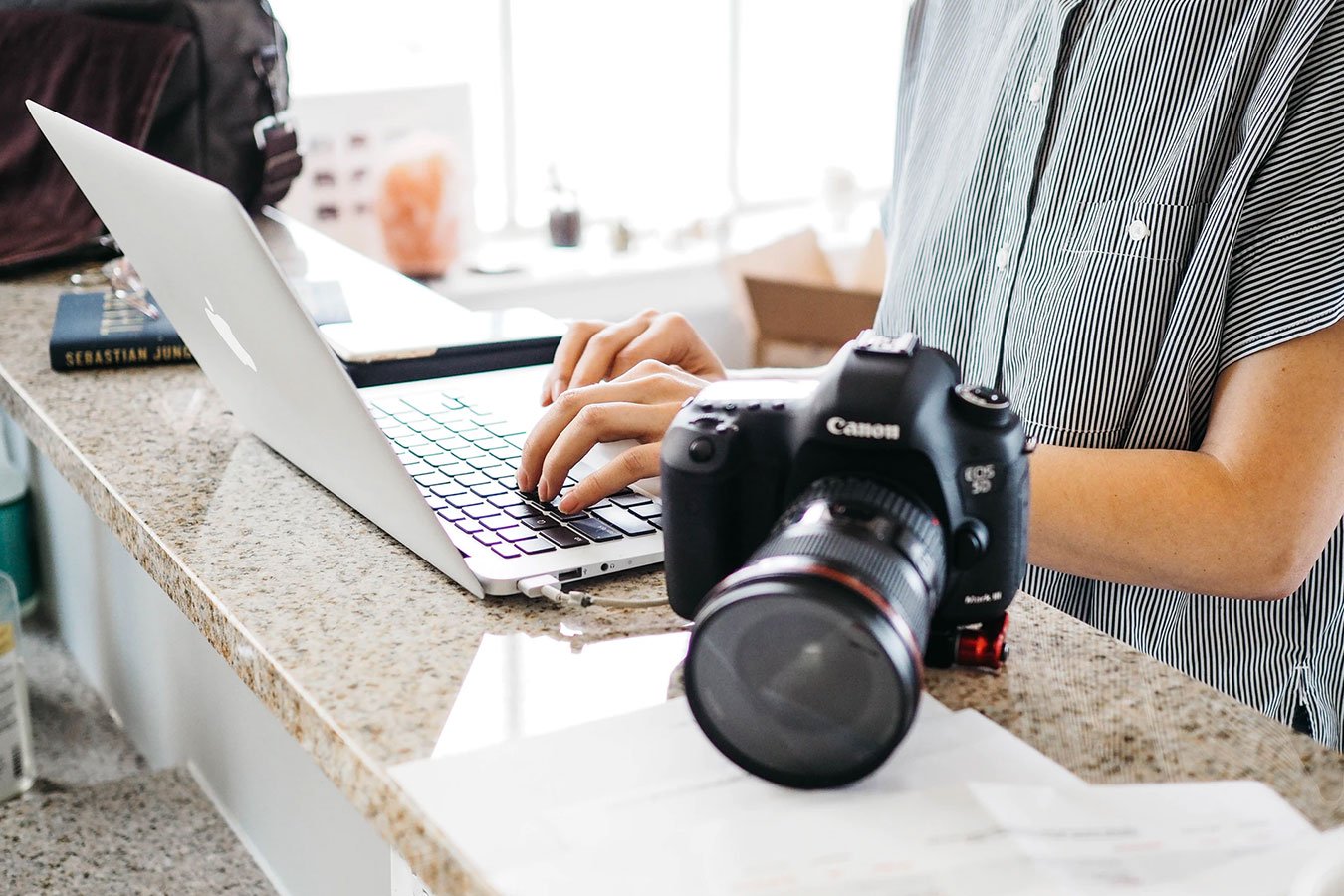 Person preparing for a photography conference